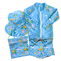 LITTLE E & CO - four-piece kids' swim set featuring a long-sleeve rash guard, swim hat, swim shorts and wet bag. The set is blue with a colourful ocean print featuring whales, turtles, fish and coral. Made with UPF 50+ sun protection fabric. The rash guard has a front zipper for easy wear, and the shorts feature an adjustable drawstring waistband for a secure fit, and the hat has adjustable toggles.