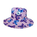 Kids swim hat in pastel purple butterfly print with UPF 50+ sun protection and adjustable toggles.