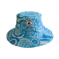 Kids swim hat in turquoise blue with a colourful Indigenous print, featuring adjustable toggles and UPF 50+ sun protection.