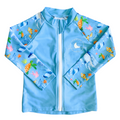 Children's rashie in pastel purple and ocean print with whales, turtles, fish, and coral, featuring UPF 50+ fabric and front zipper.