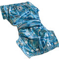 LITTLE E & CO – kids swim nappy, a turquoise blue with a colourful contemporary indigenous print. The swim nappy is a one size fits most design and has 3 adjustable snap settings.