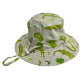 Children's sun hat with crocodile and green leaf pattern on a white background