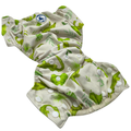 Green and white patterned cloth diaper or reusable swim nappy on a white background
