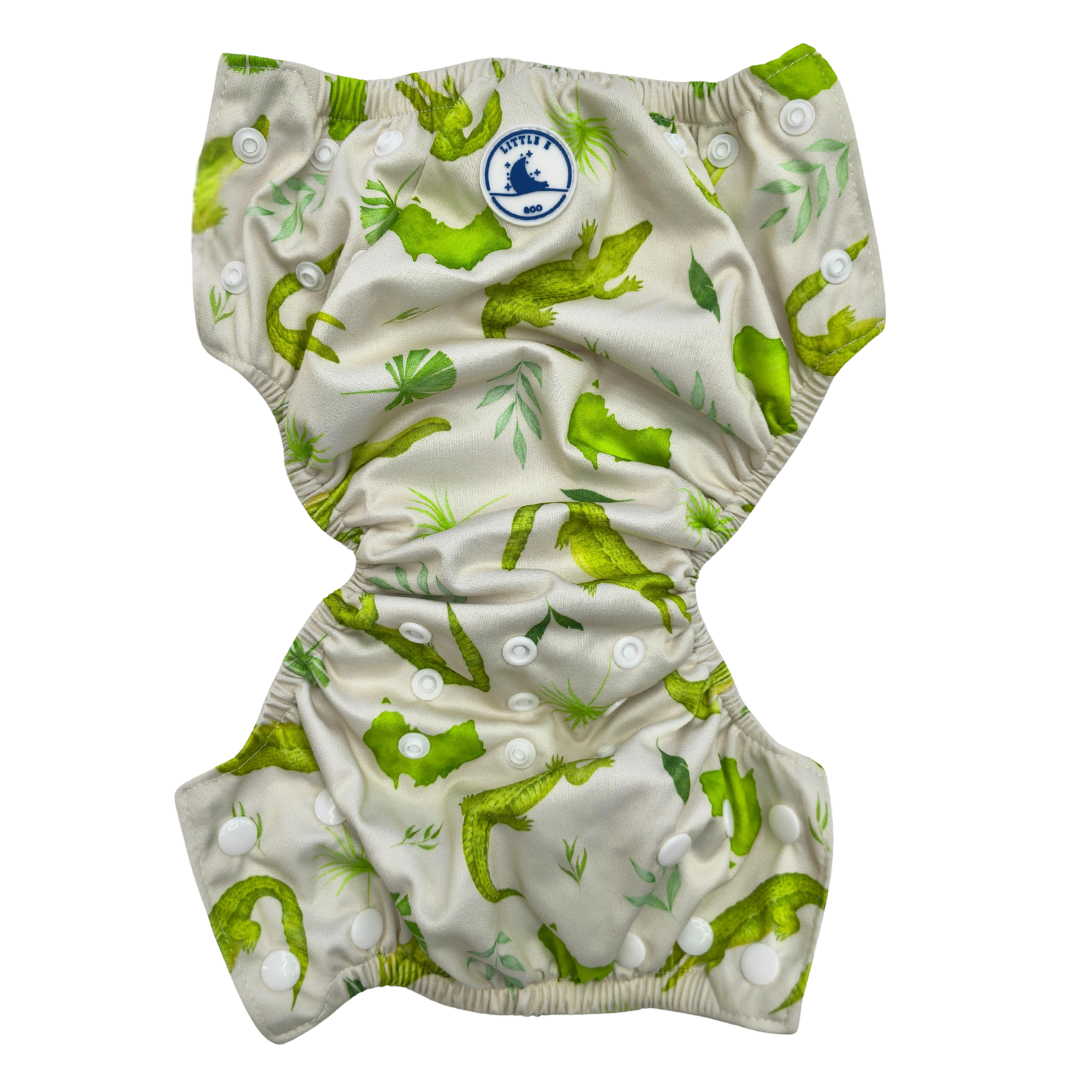 Green and white patterned diaper or resusable swim nappy with a brand logo on a white background