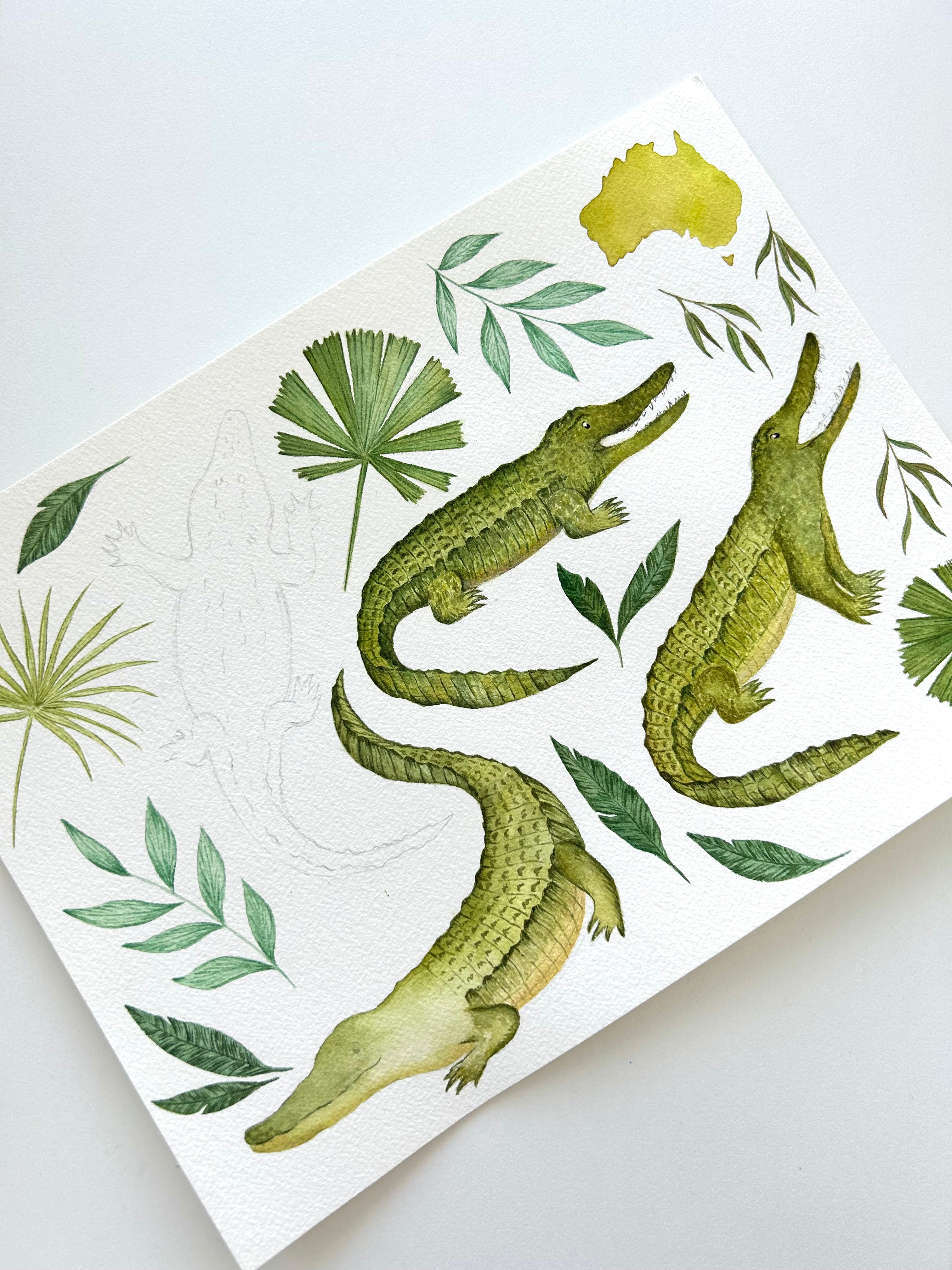 Decorative paper with crocodile illustrations and green leaves on a white background- Little E & Co Printslider_item_XP9by9