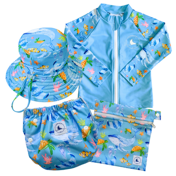 LITTLE E & CO - four-piece kids' swim set featuring a long-sleeve rash guard, swim hat, swim nappy and wet bag. The set is a blue with a colourful ocean print featuring whales, turtles, fish and coral. Made with UPF 50+ sun protection fabric. The rash guard has a front zipper for easy wear, and the swim nappy has adjustable snaps, and the hat has adjustable toggles.