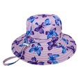 LITTLE E & CO – kids swim hat, a pastel purple with a colourful pink, blue and purple butterflies. Made with UPF 50+ sun protection fabric. The swim hat features adjustable toggles