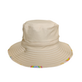 LITTLE E & CO – kids swim hat, a pale yellow with a colourful rainbow and sun print. Made with UPF 50+ sun protection fabric. The swim hat features adjustable toggles