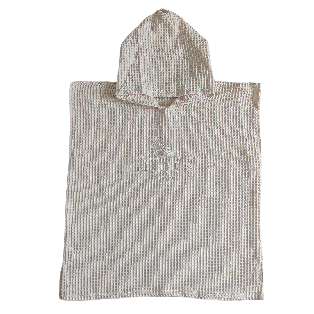 LITTLE E & CO - 100% Waffle Cotton Hooded Poncho Towel with embodied logo in a cream colour