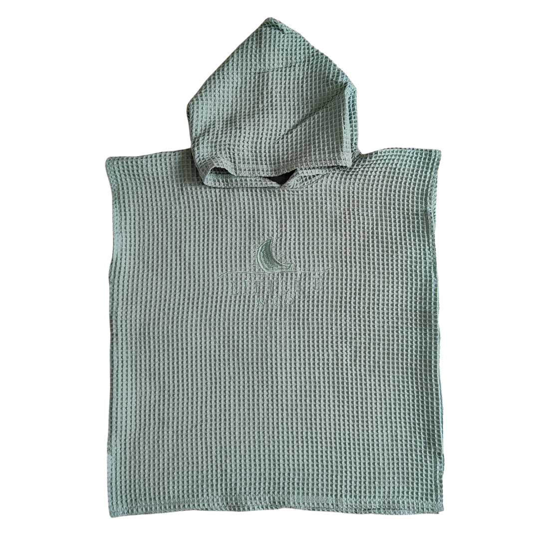 LITTLE E & CO - 100% Waffle Cotton Hooded Poncho Towel with embodied logo in a sage green colour