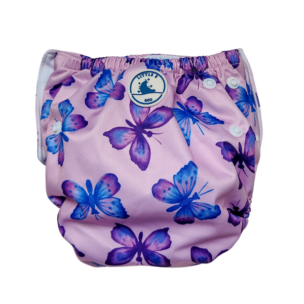 Reusable swim nappy in Butterflies print, a pastel purple design with pink, blue and purple butterflies