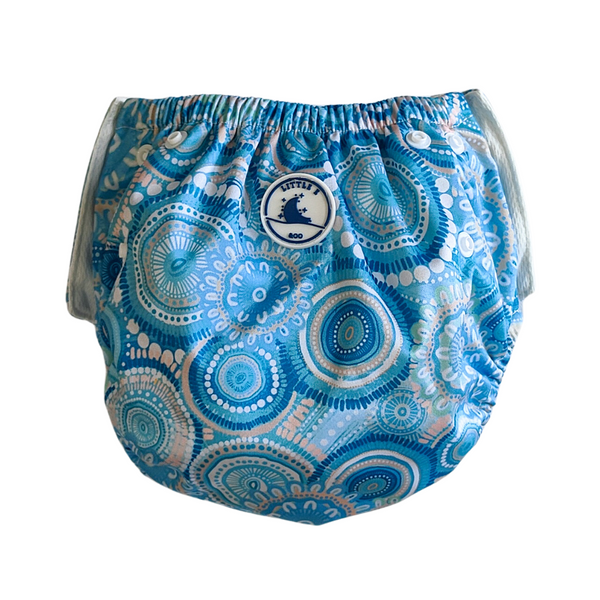 Reusable swim nappy in Called Home to the Ocean print, a turquoise blue contemporary Indigenous design