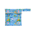 LITTLE E & CO – Mini wet bag, a blue with a colourful ocean print featuring whales, turtles, fish and coral. The wet bag is made from waterproof PUL and has a strap.