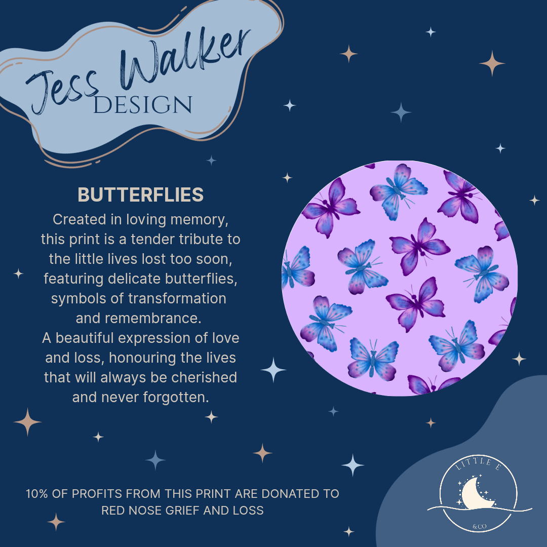 Mini wet bag in pastel purple with pink, blue, and purple butterflies, made from waterproof PUL with a handy strap.

