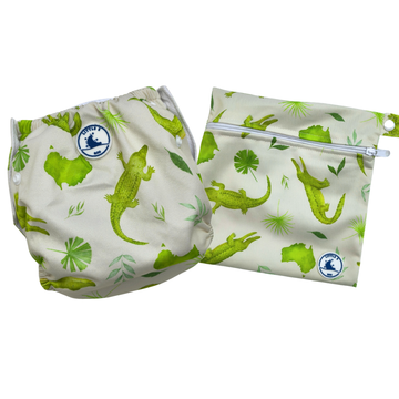 Two reusable bags with green crocodile pattern on a beige fabric