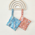 Mini wet bag with fun, colourful print, made from waterproof PUL and features a handy strap.

